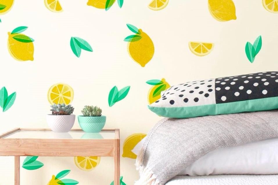 lemon stickers on pale wall