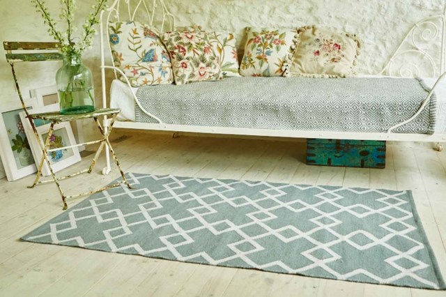 day bench with rug on timber floor