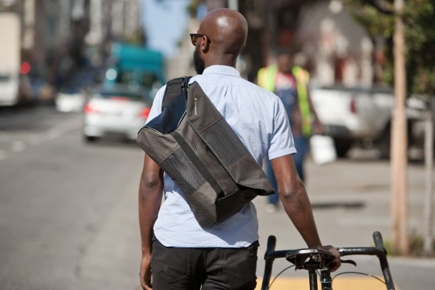 man wearing cross body bag