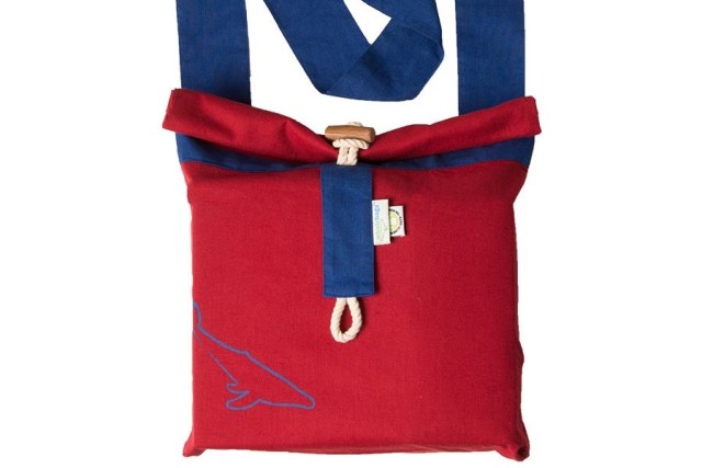 red messenger bag with blue strap