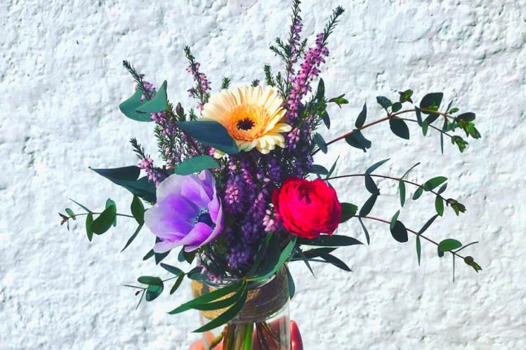 bunch of flowers in a jar