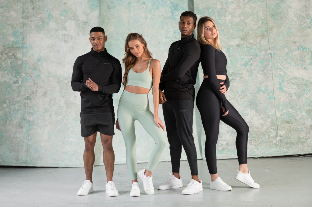 4 people wearing sustainable irish athleisure wear by Awave against pale backdrop