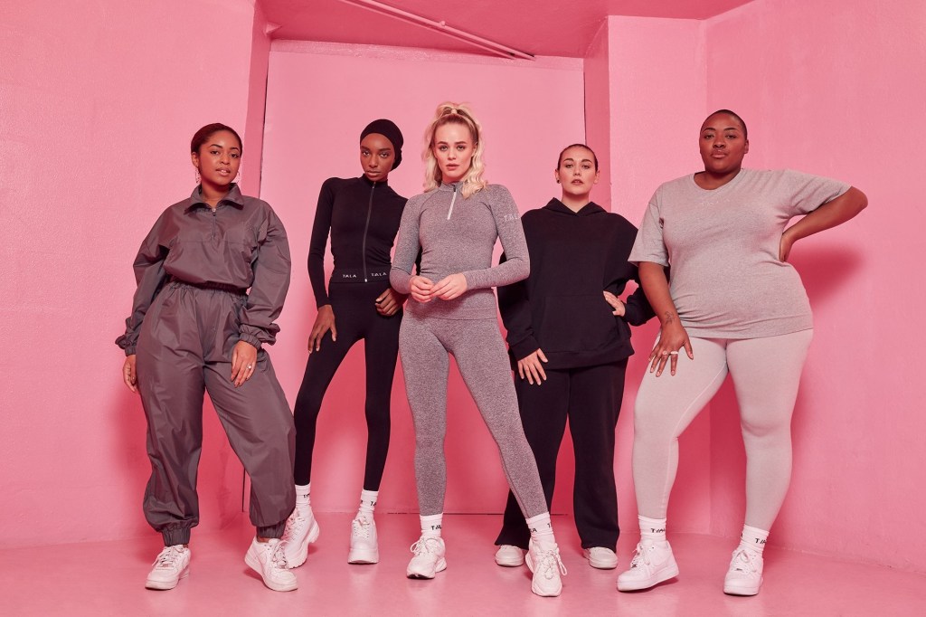 sustainable fitness wear - group of people wearing sportsgear against a pink background